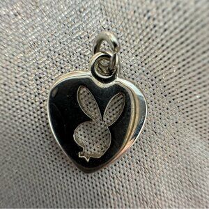Playboy bunny necklace pendant silver hardware opening in middle heart rabbit